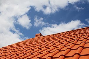 tile roof with blue sky above